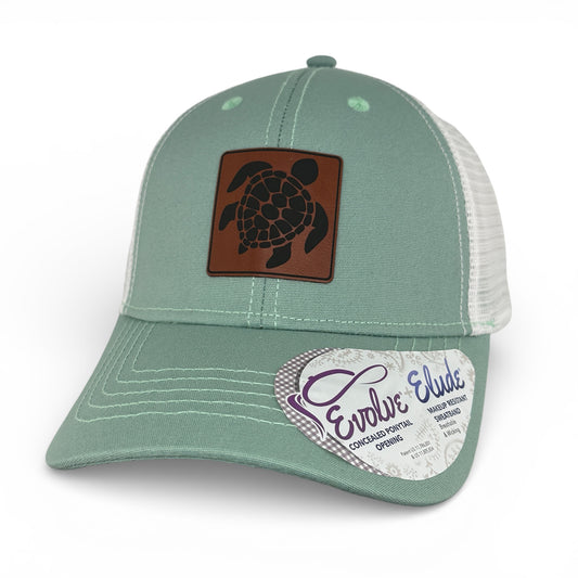 Green cap with turtle emblem and 'Evolve Elude' label on a white background